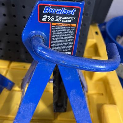 Two moving blankets, 2 1/4 ton jackstand and black plastic squares