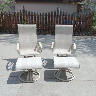 2 VERY NICE ROCKING PATIO CHAIRS WITH OTTOMANS AND A SIDE TABLE