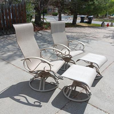 2 VERY NICE ROCKING PATIO CHAIRS WITH OTTOMANS AND A SIDE TABLE