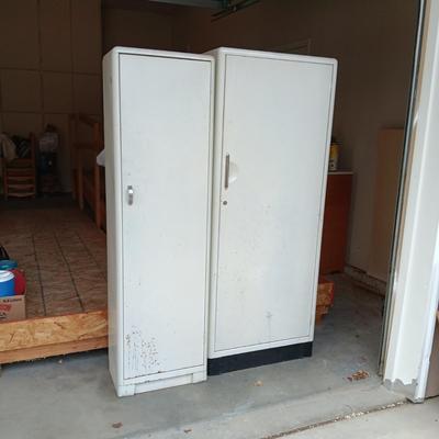 2 METAL STORAGE CABINETS (1 LOCKS WITH KEY)