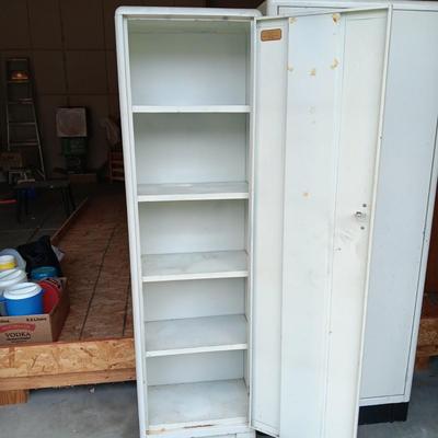 2 METAL STORAGE CABINETS (1 LOCKS WITH KEY)