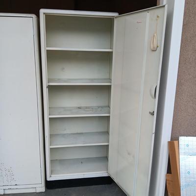 2 METAL STORAGE CABINETS (1 LOCKS WITH KEY)