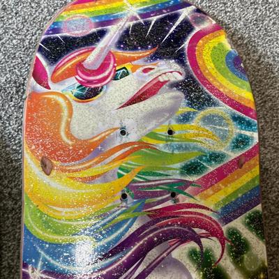 Skateboard and racket