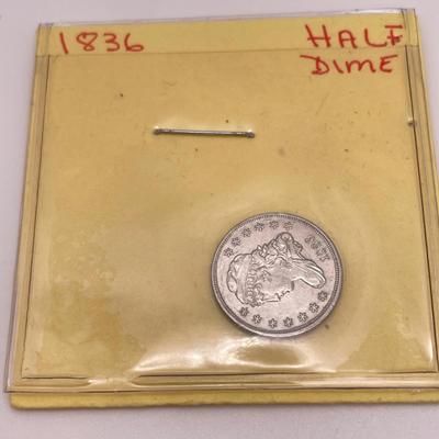 Four Morgan Dollars, a Cincinnati Half Dollar & Capped Bust Half Dime (ST-SS)