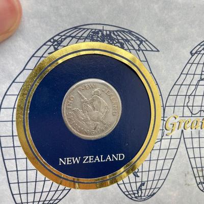 1934 Chinese Silver “Junk Dollar” and 1945 NZ Shilling with Stamps (ST-SS)
