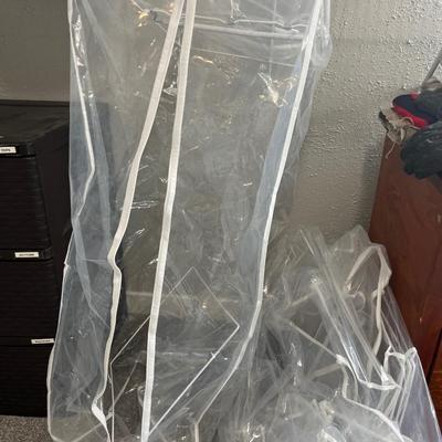 Three plastic hanging bag organizers