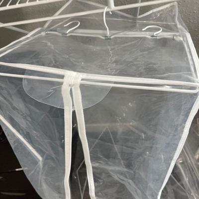 Three plastic hanging bag organizers