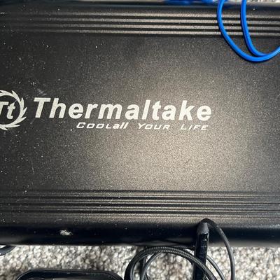 Hard drive enclosure, power cords, and miscellaneous computer