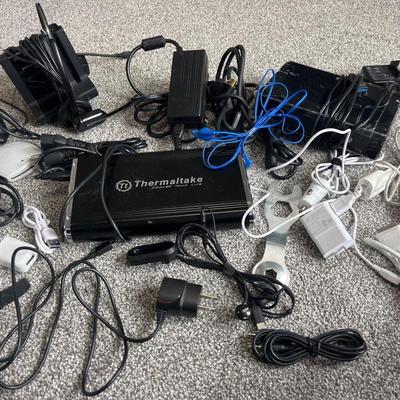 Hard drive enclosure, power cords, and miscellaneous computer