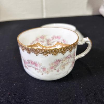 Antique mustache teacup and saucer