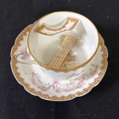 Antique mustache teacup and saucer