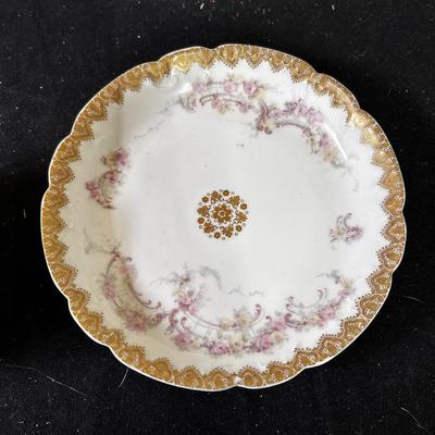 Antique mustache teacup and saucer