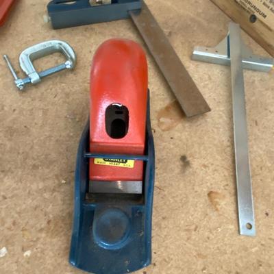 STANLEY MITER BOX/W SAW, PLANER, SANDING BLOCK, C-CLAMP, AND A COMBINATION SQUARE