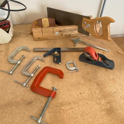 STANLEY MITER BOX/W SAW, PLANER, SANDING BLOCK, C-CLAMP, AND A COMBINATION SQUARE
