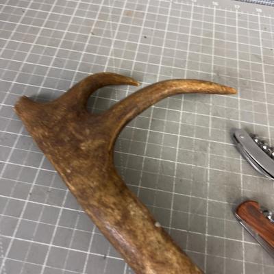 Antler Can Opener and a few wine Bottle Openers. 