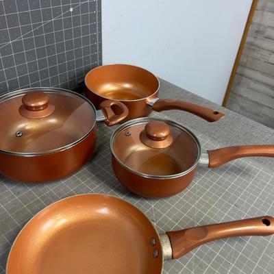 Set of Copper Colored Pots and Pans 