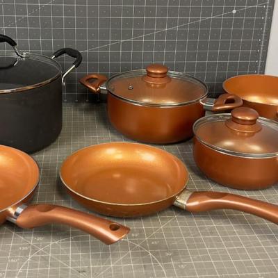 Set of Copper Colored Pots and Pans 