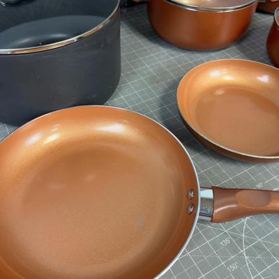 Set of Copper Colored Pots and Pans 