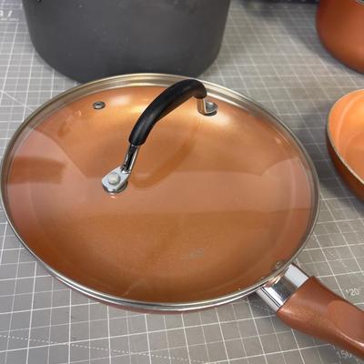 Set of Copper Colored Pots and Pans 