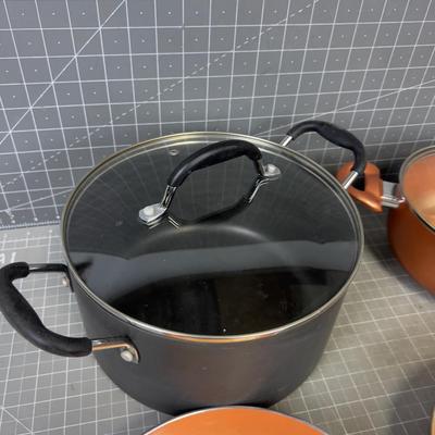 Set of Copper Colored Pots and Pans 
