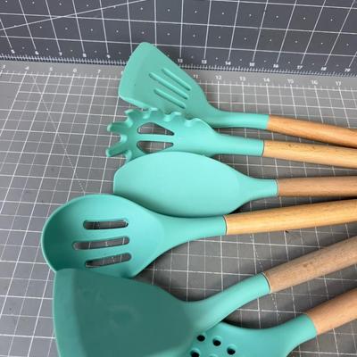 Turquoise Plastic and Wooden Kitchen Utensils for Cooking 