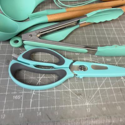 Turquoise Plastic and Wooden Kitchen Utensils for Cooking 