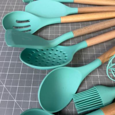 Turquoise Plastic and Wooden Kitchen Utensils for Cooking 