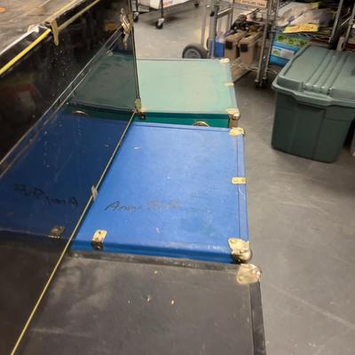 (7) Pile of Foot Locker Style Trunks 