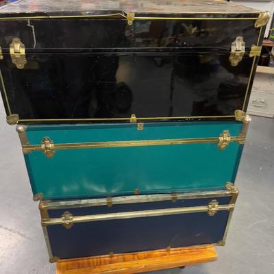 (7) Pile of Foot Locker Style Trunks 