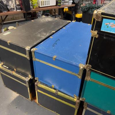 (7) Pile of Foot Locker Style Trunks 