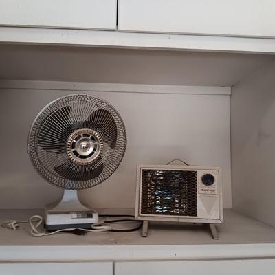 OSCILLATING FAN AND AN ELECTRIC HEATER