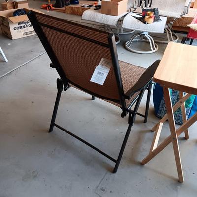 2 NEW FOLDING SLING CHAIRS, SOFT SIDED COOLER AND A FOLDING TABLE