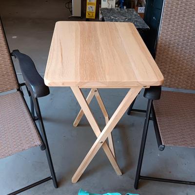 2 NEW FOLDING SLING CHAIRS, SOFT SIDED COOLER AND A FOLDING TABLE