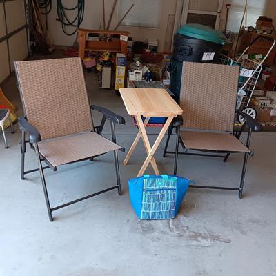 2 NEW FOLDING SLING CHAIRS, SOFT SIDED COOLER AND A FOLDING TABLE
