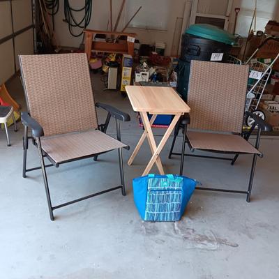 2 NEW FOLDING SLING CHAIRS, SOFT SIDED COOLER AND A FOLDING TABLE
