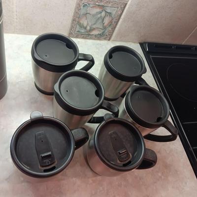 TRAVEL CUPS AND A LARGE THERMOS