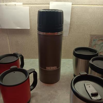 TRAVEL CUPS AND A LARGE THERMOS