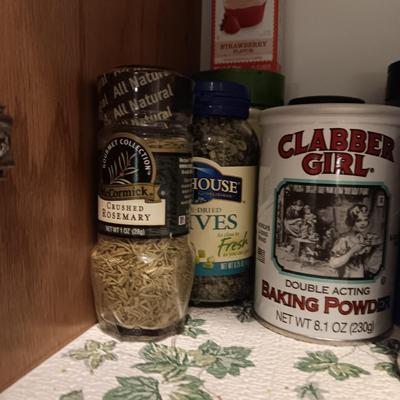A VARIETY OF SPICES AND A SET OF SHAKERS
