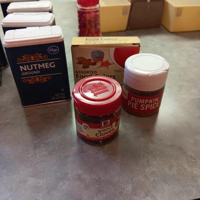 A VARIETY OF SPICES AND A SET OF SHAKERS
