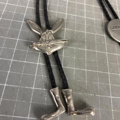 (2) Bolero Ties: Bugs Bunny and Snow Bird. 