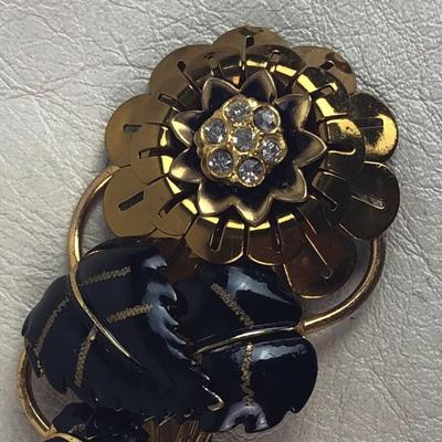 vintage GOLD TONE FLORAL BROOCH BLACK ENAMEL LEAVES WHITE RHINESTONES