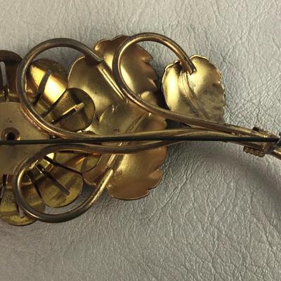 vintage GOLD TONE FLORAL BROOCH BLACK ENAMEL LEAVES WHITE RHINESTONES