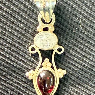 Ruby Red stone with gold pendant