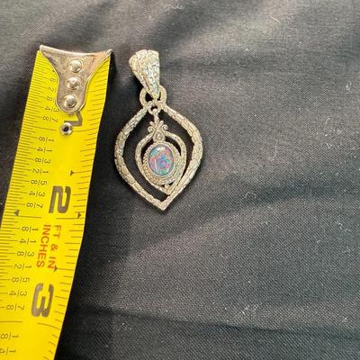 Sterling Silver Pendant w/ multicolored gem