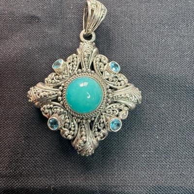 Sterling Silver with Turquoise center and blue topaz