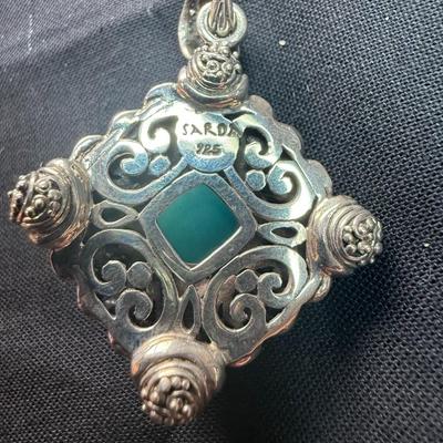 Sterling Silver with Turquoise center and blue topaz