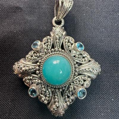 Sterling Silver with Turquoise center and blue topaz