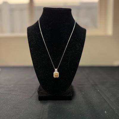 Emerald Cut Yellow Gems with white zicron