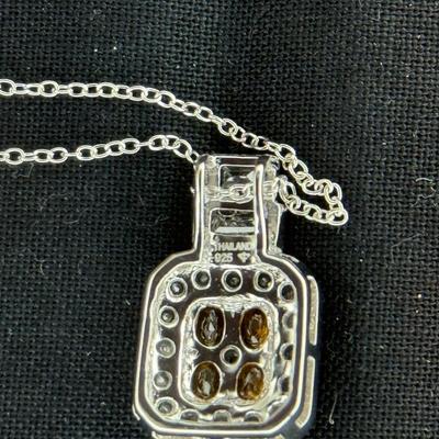 Emerald Cut Yellow Gems with white zicron