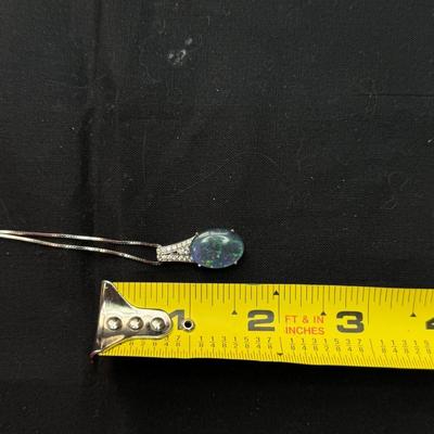 .60CTW. Oval Pendant w/ White Zircon